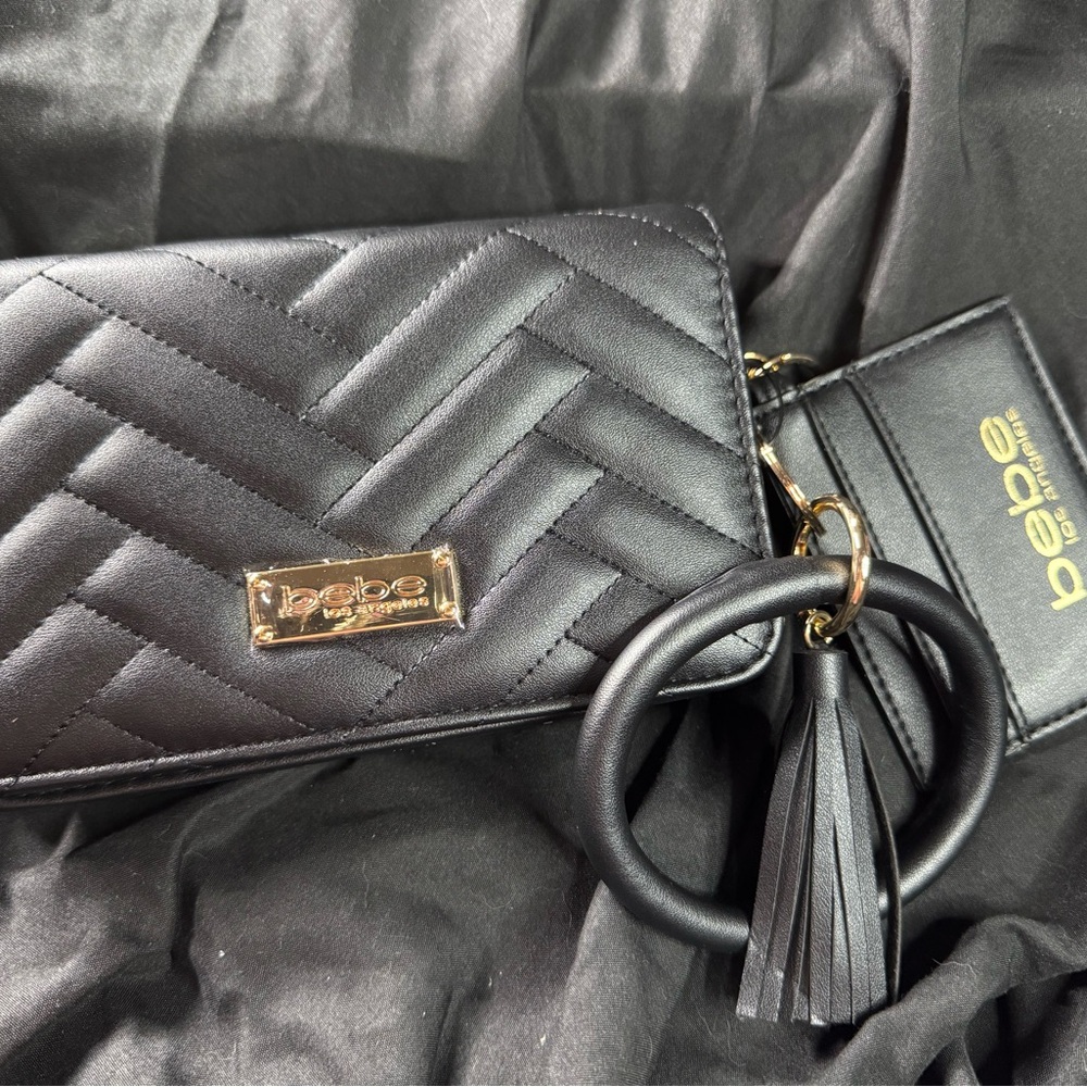 Bebe Elegant Black Clutch with Gold Detail NWT